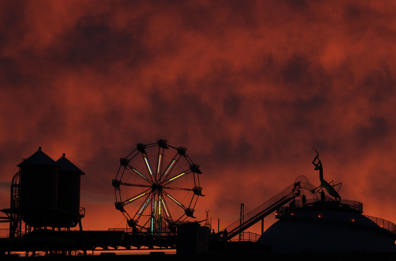 Roof of City Museum silhouetted against sunset